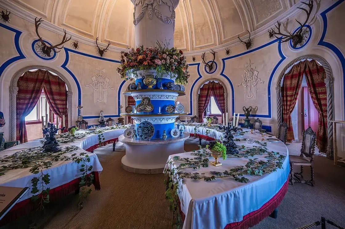 An elegantly set formal reception hall with floral centerpieces — wedding planners and coordinators in Utah Valley