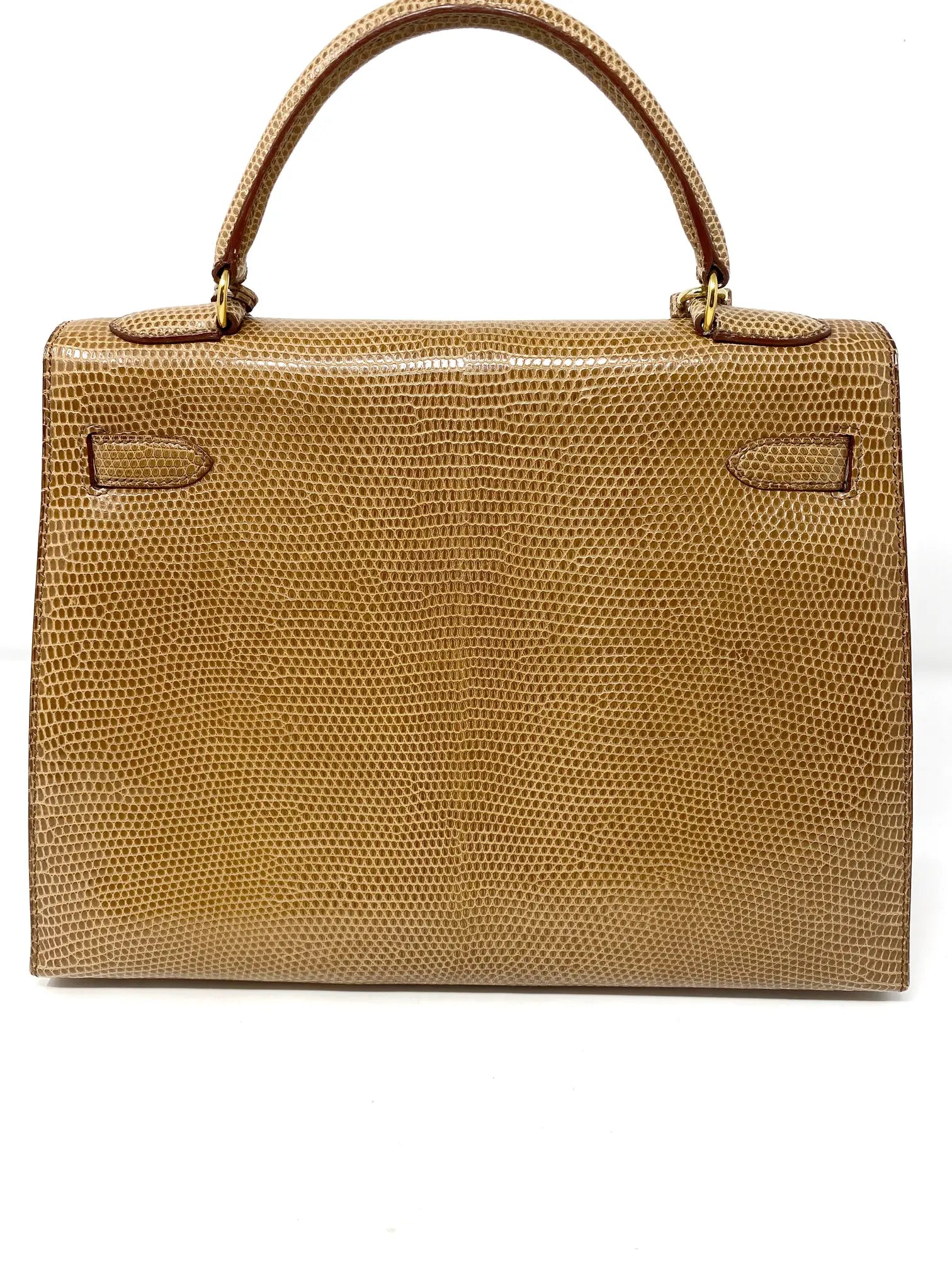 A beige lizard Sellier Kelly 32 with gold hardware: the classic small-format exotic.