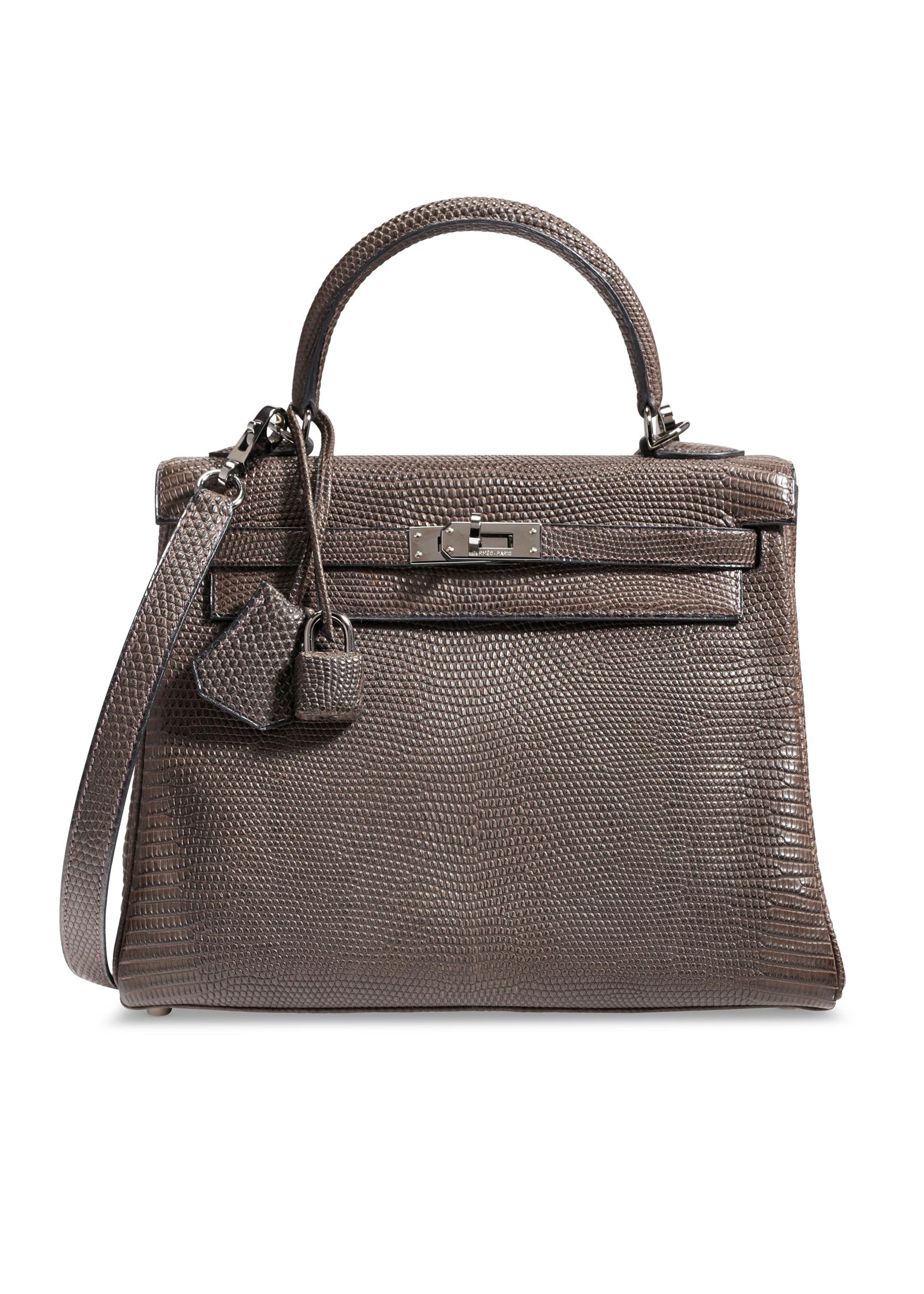 A matte ébène Salvator lizard Kelly 25 with ruthenium hardware, 2005 — sold for USD 37,500 at Christie's.