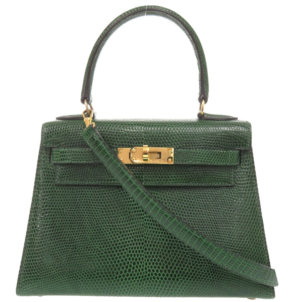 A 1991 mini Kelly Sellier in green lizard with gold hardware: three decades on, still collectible.