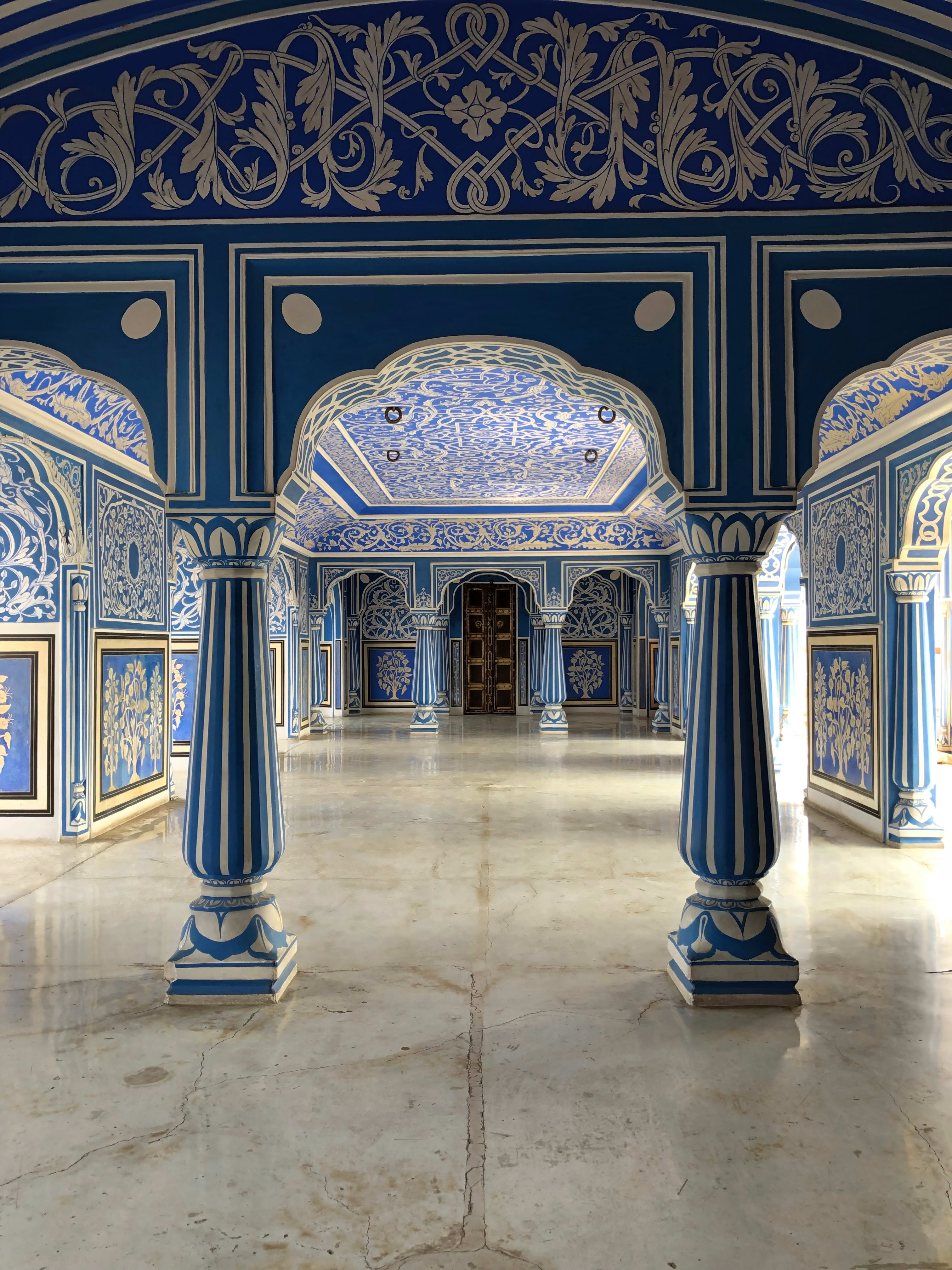 Blue decorated walls and architectural details at Jaipur City Palace.