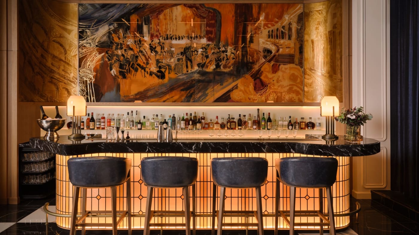 The St. Regis Bar counter in the Klotild Palace, beneath a large painted mural