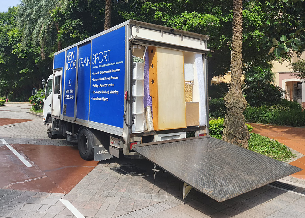 New Look Transport truck loaded with wrapped furniture on a move