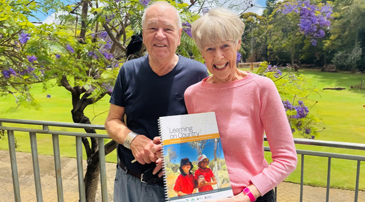 Emeritus Professor Don Bradshaw and Honorary Research Associate Felicity Bradshaw with the new schools resource Learning on Country. Image credit: The University of Western Australia