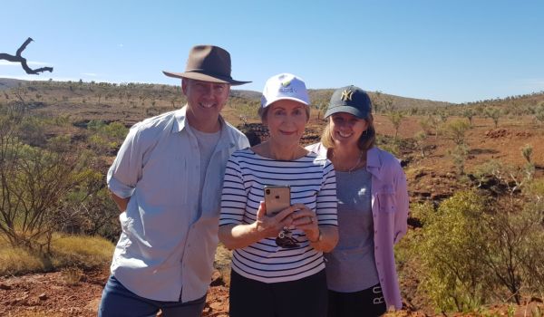 Kerry Sanderson (centre) with Jeremy Edwards, CEO of the East Pilbara Shire, and his wife, Amanda in Karijini National Park