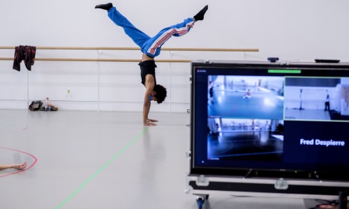 Rambert dancer with camera