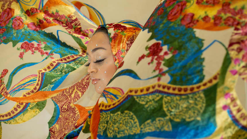 woman wrapped in a colourful head scarf