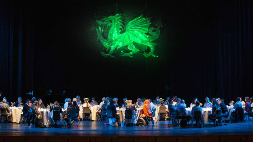 People having afternoon tea on the Donald Gordon Theatre stage.