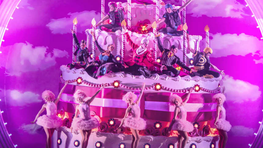 Giant cake with dancers close up 