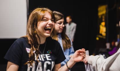 Young Life Hack attendee smiling broadly 
