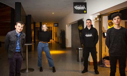 Radio Platfform team stood outside in a corridor