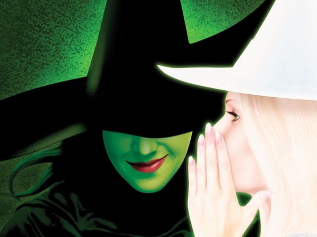 An illustration of Elphaba and Glinda