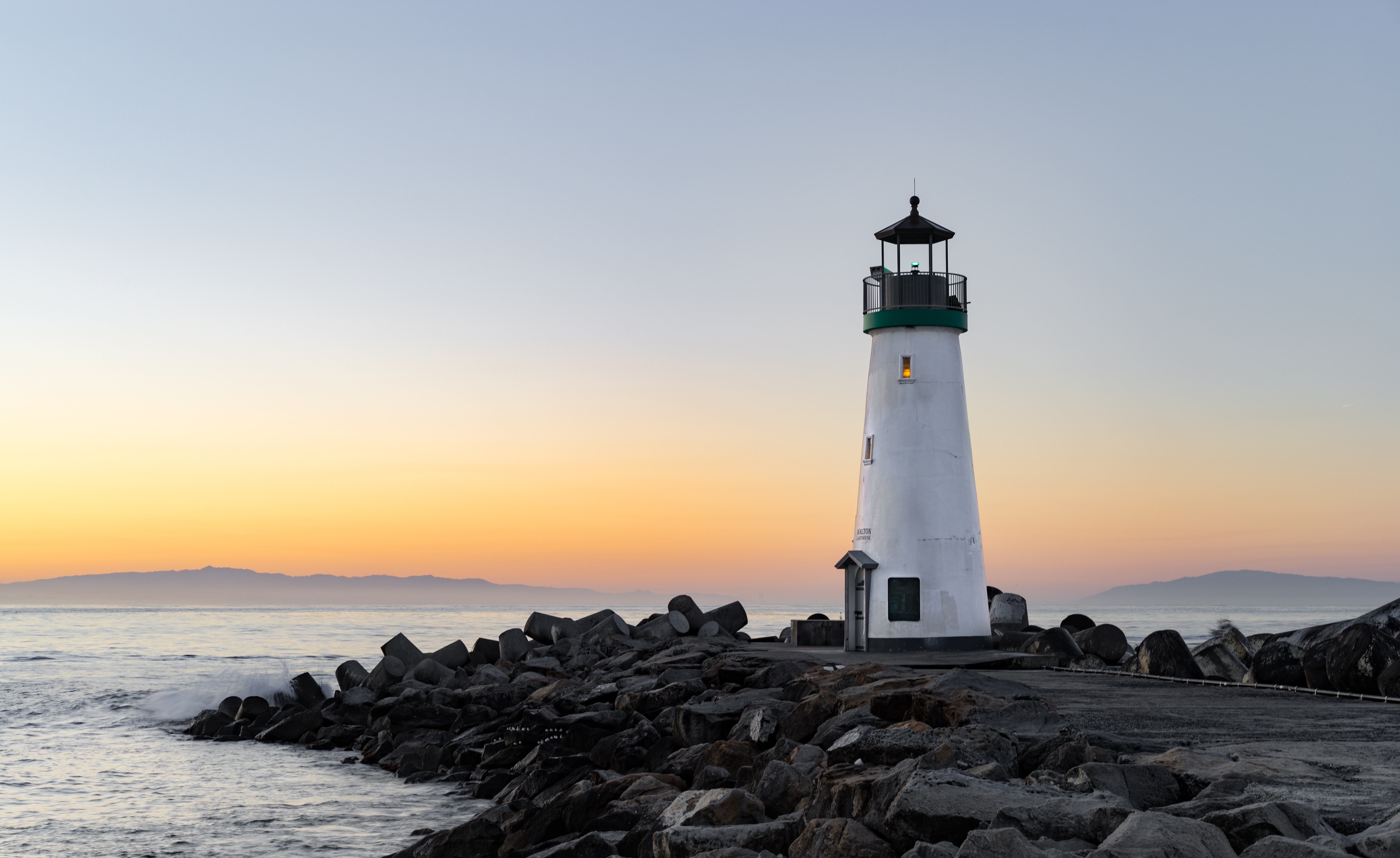 lighthouse near body of water