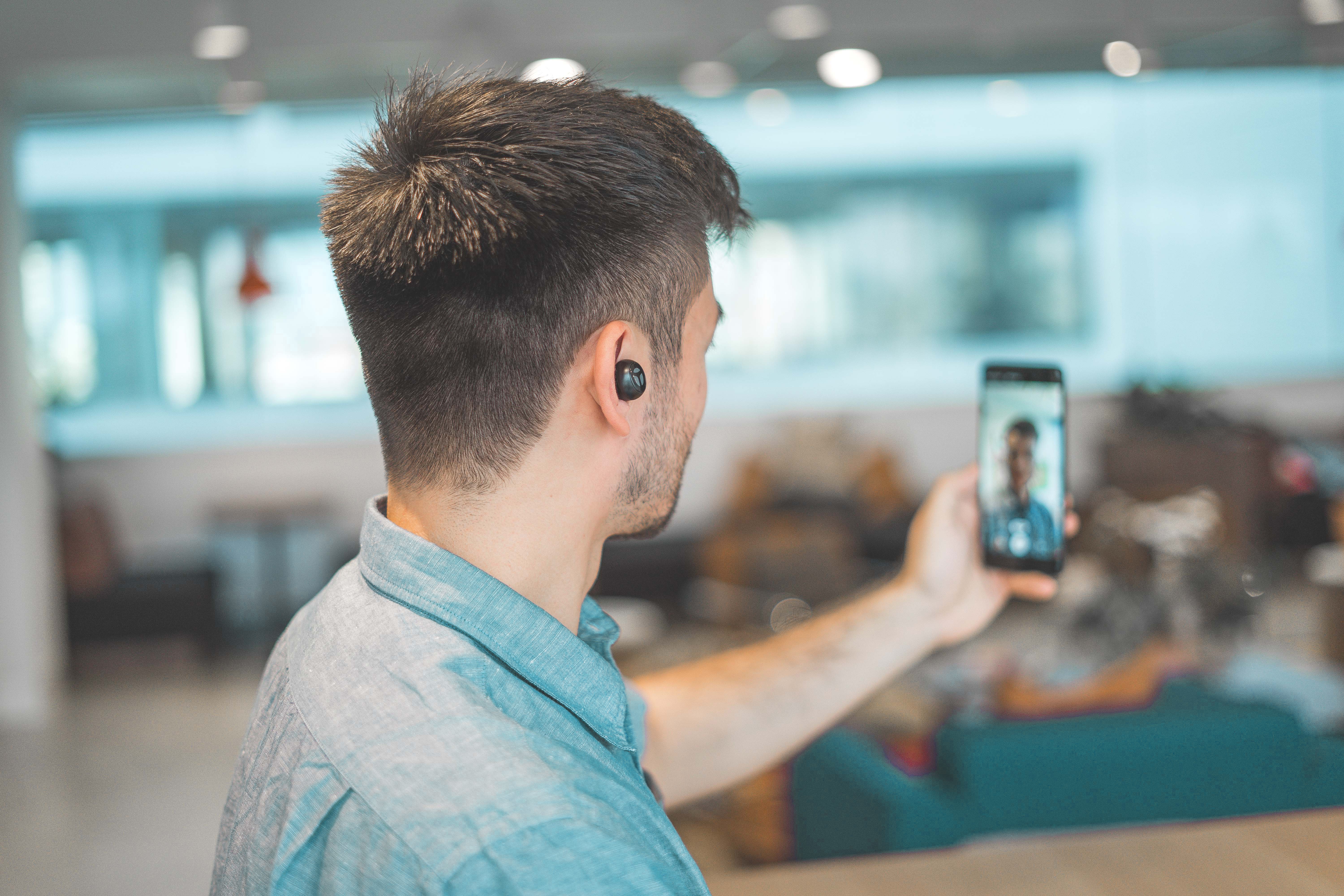 man on mobile phone video chat