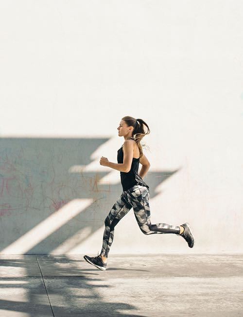 Image of a woman running.