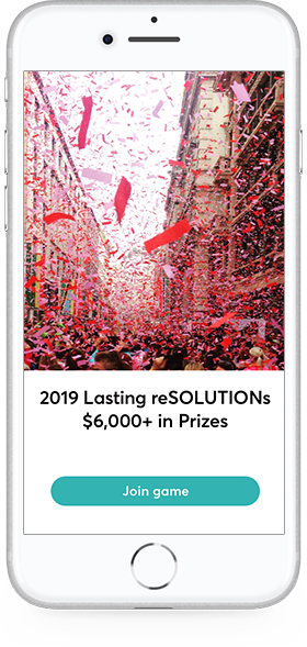 Red confetti falling from the sky on a crowd celebrating the new year.