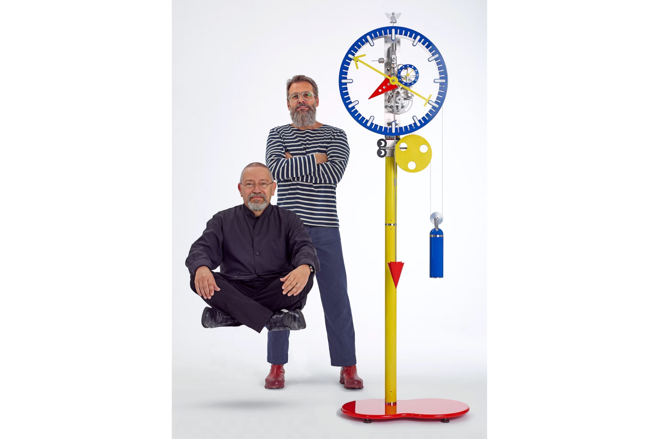 Alain Silberstein (left) and UTINAM's Philippe Lebru (right) pictured together with the KB2 floor clock.png