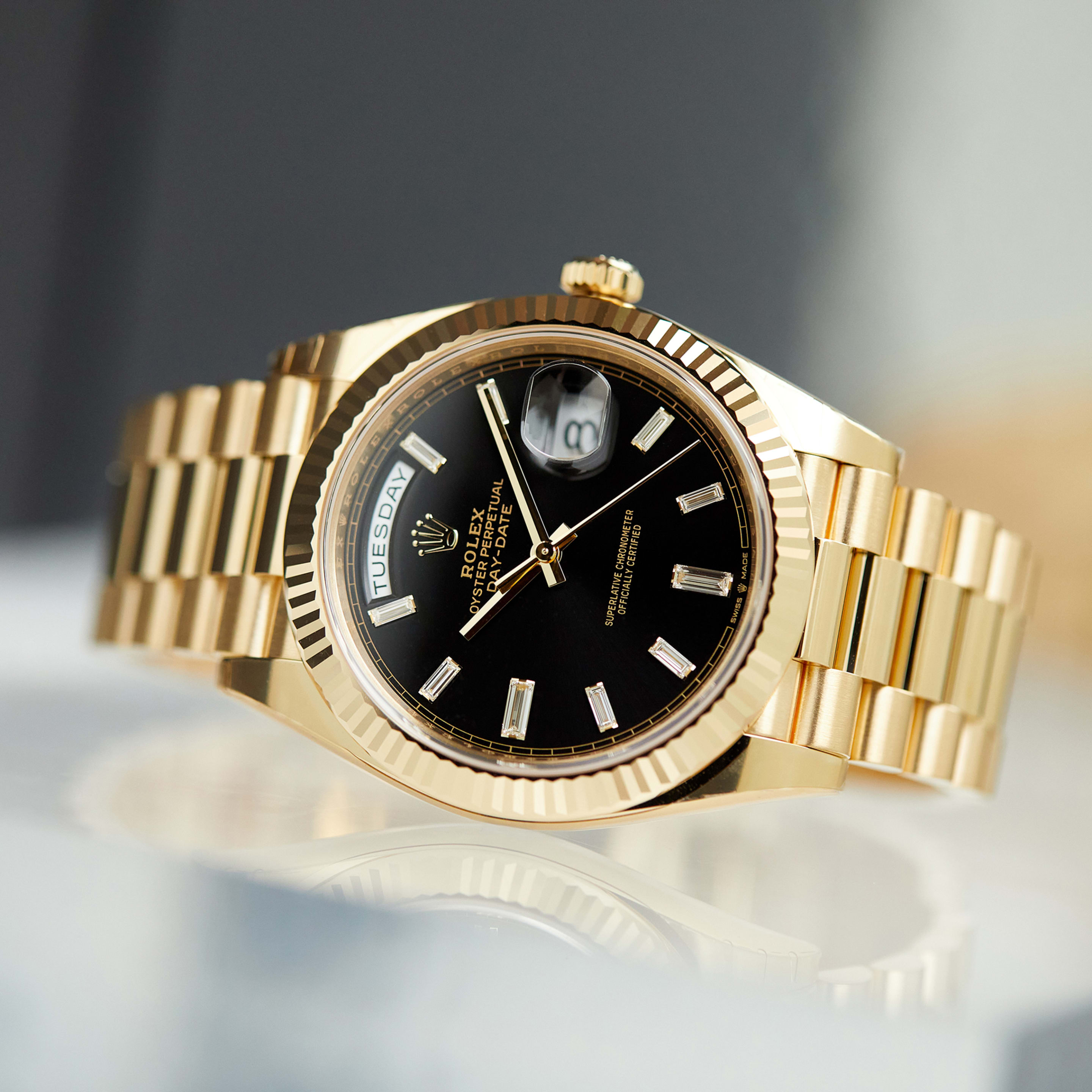 Day-Date Yellow Gold Black Dial 40mm Product Image