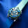 M.A.D.1S Grow Your Dreams "Water" Yinka Ilori Steel 42mm Lifestyle Images button