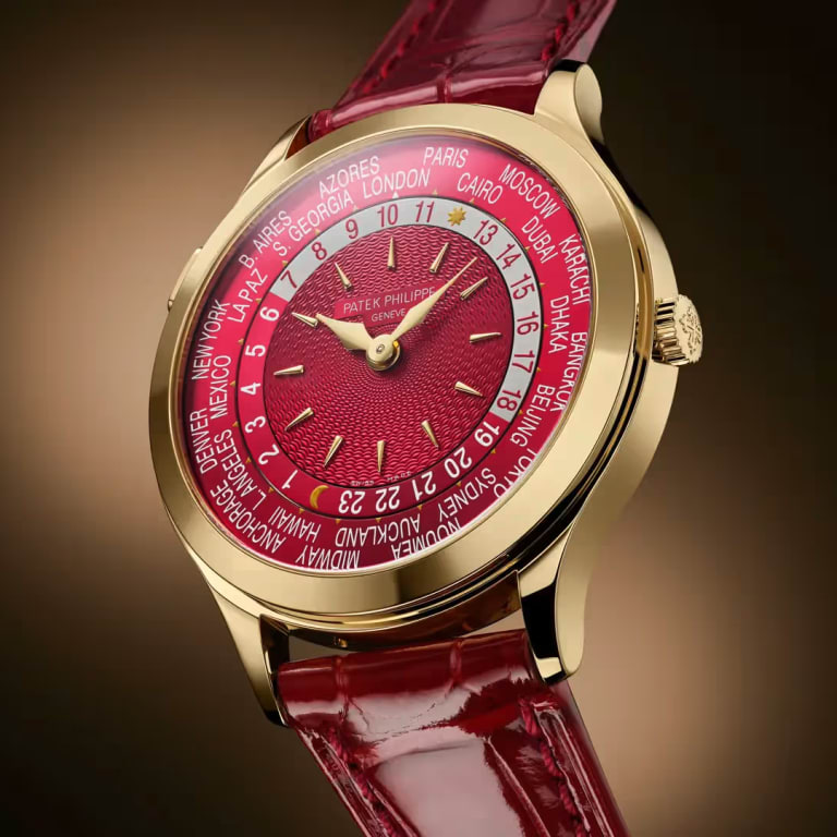 World Time Yellow Gold Red Dial 36mm Product Image 1