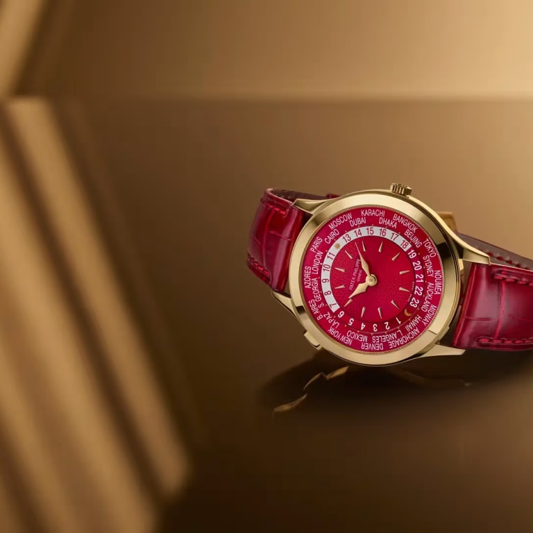 World Time Yellow Gold Red Dial 36mm Product Image 3