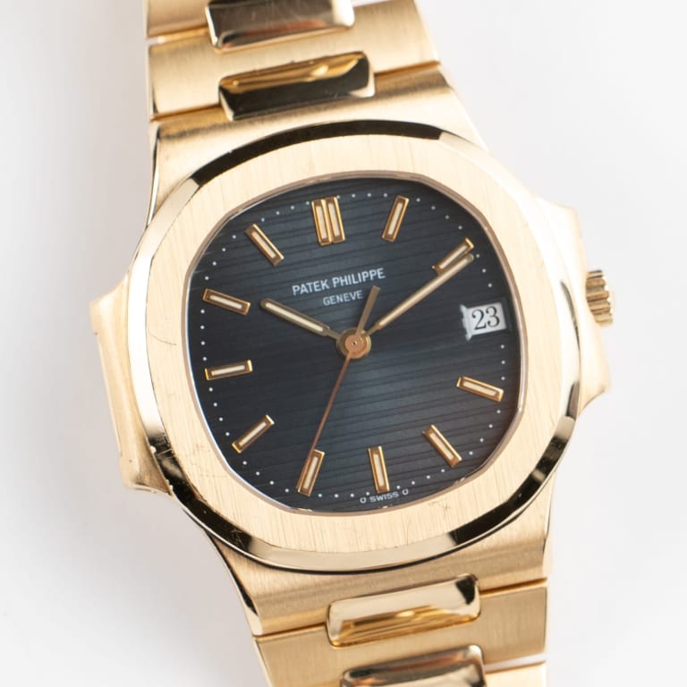 Vintage Nautilus Yellow Gold Blue Dial 37mm Product Image 1