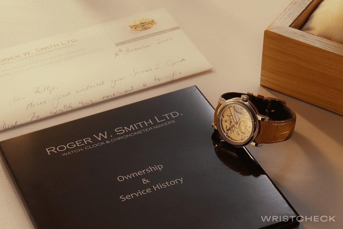 The timepiece includes an Ownership & Service History Booklet and a Certificate of Authenticity, firmly establishing its provenance and value