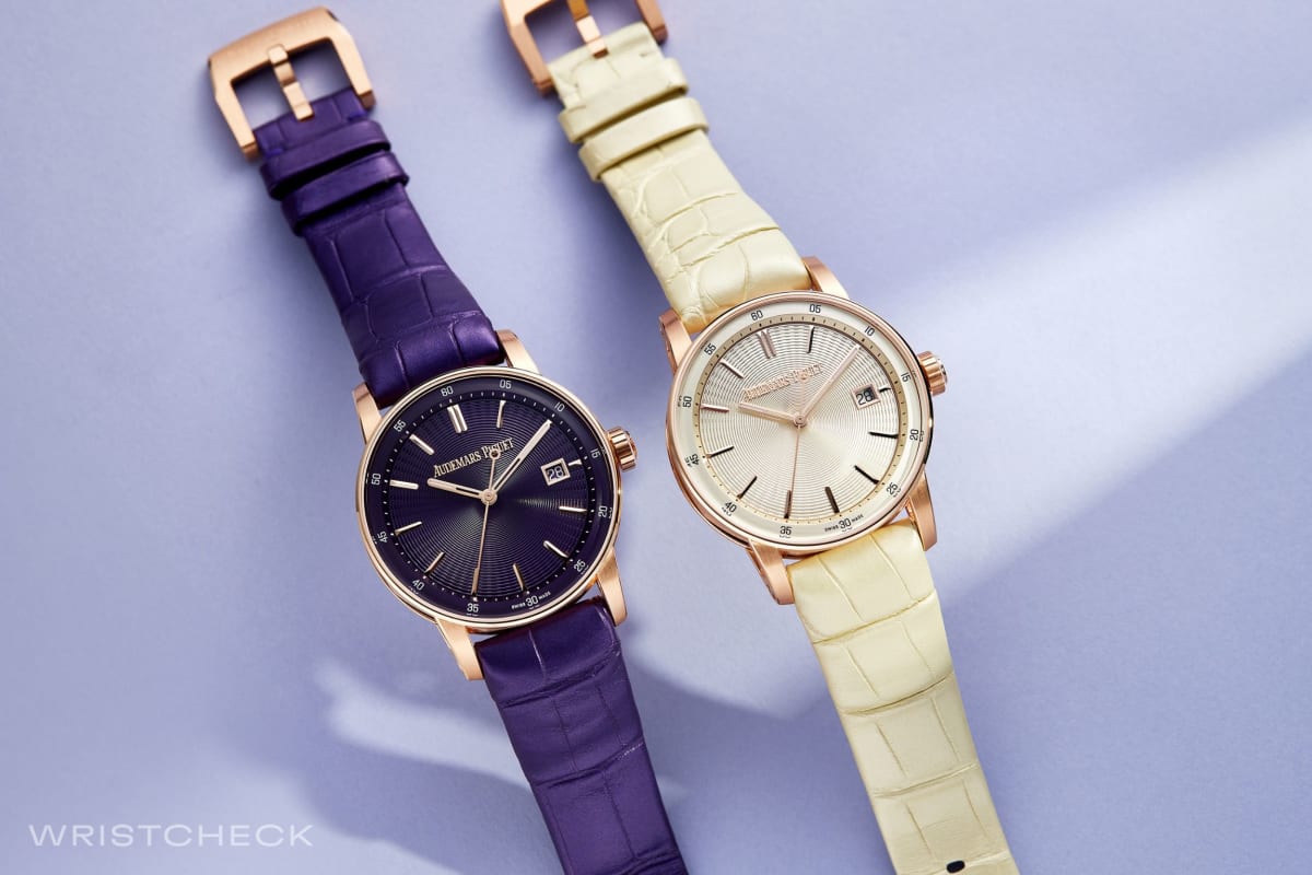 One watch features a subdued ivory shade, while the other boasts an opulent purple dial, both adorned with the guilloché effect found in recent steel releases. Each watch takes around 1.5 months to produce