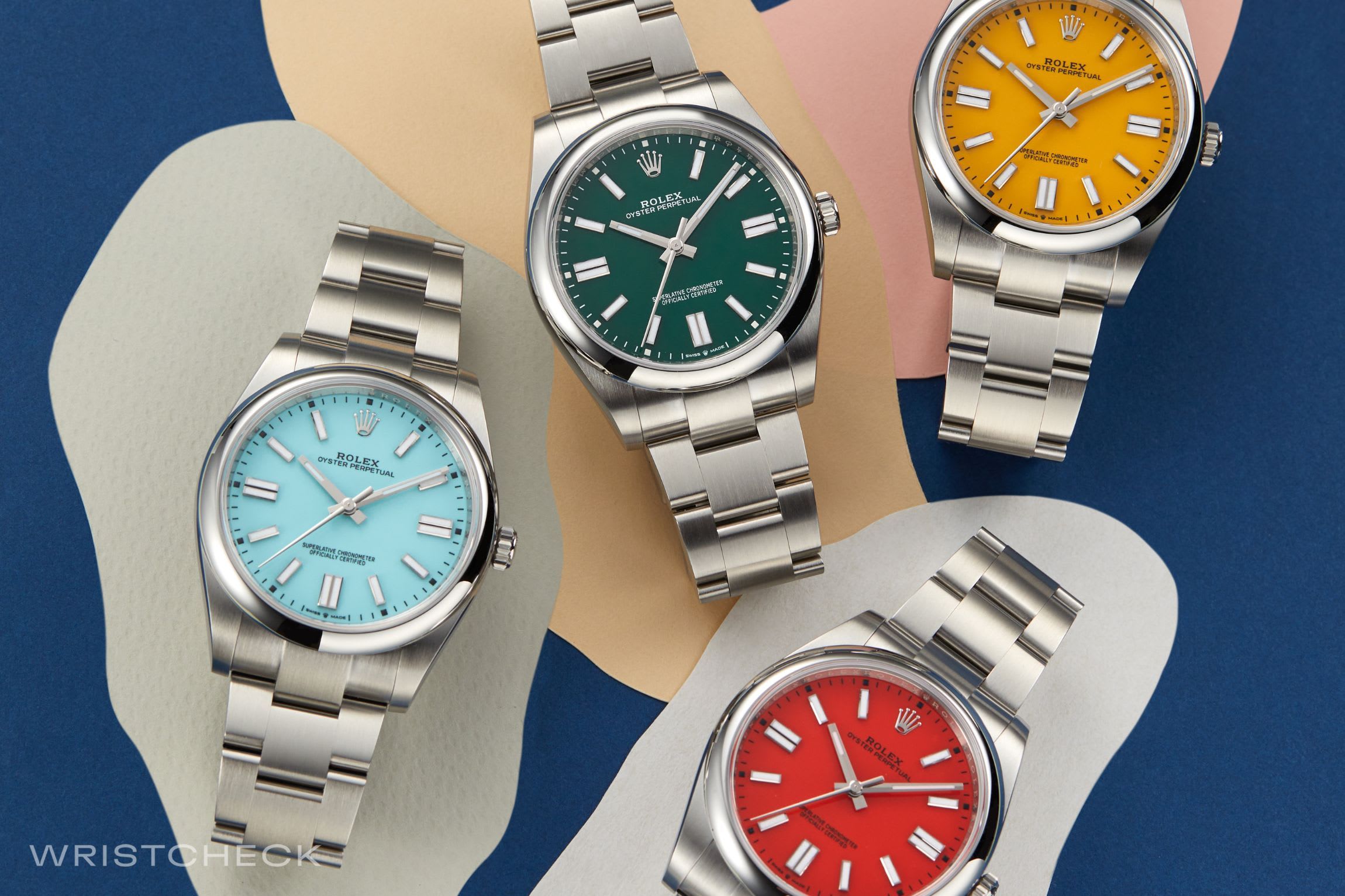 A collection of Rolex Oyster Perpetual 41mm watches in Tiffany, Red, Green and Yellow