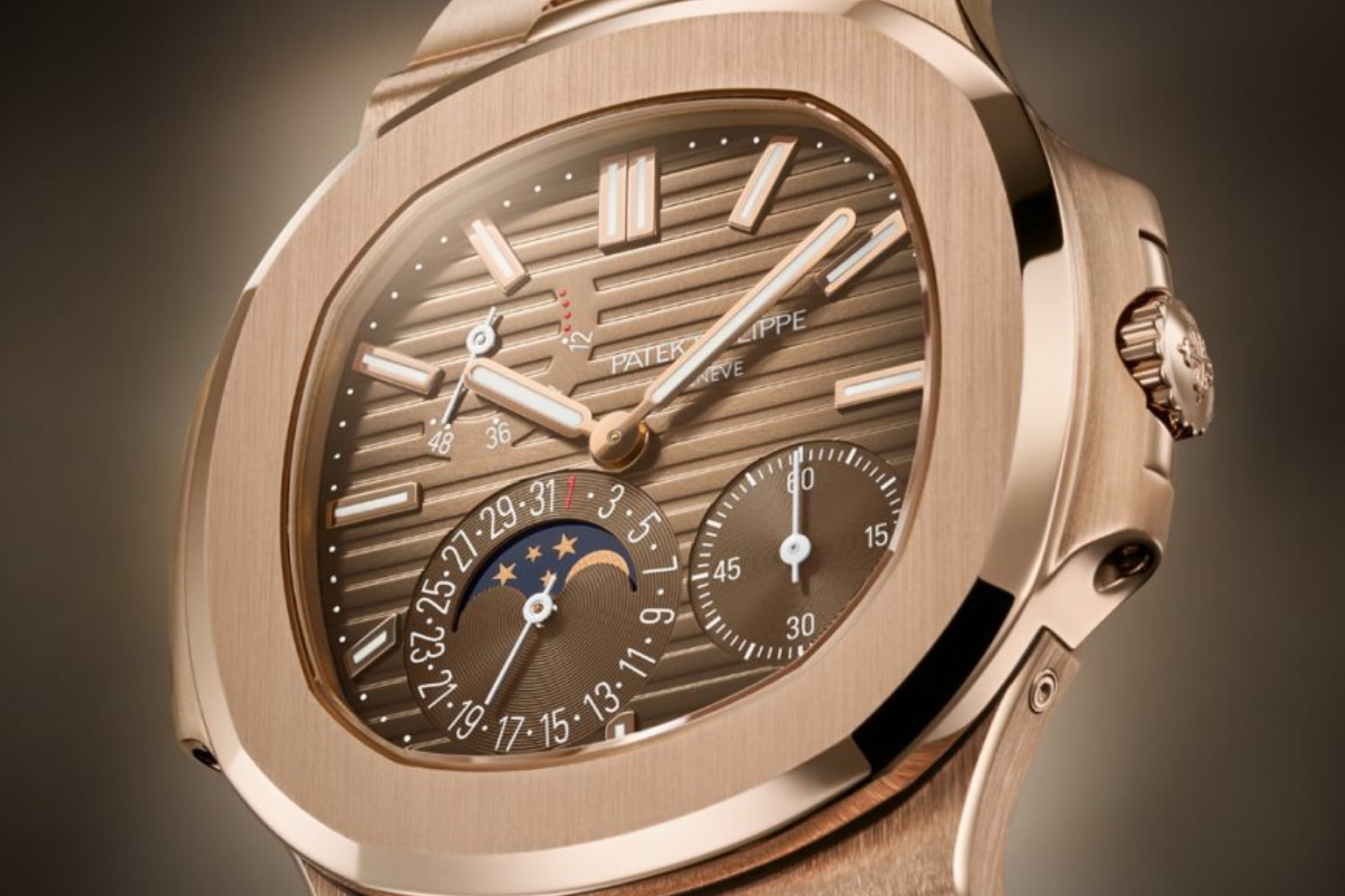 Patek Philippe Nautilus ref. 5712/1R and 5712/1G