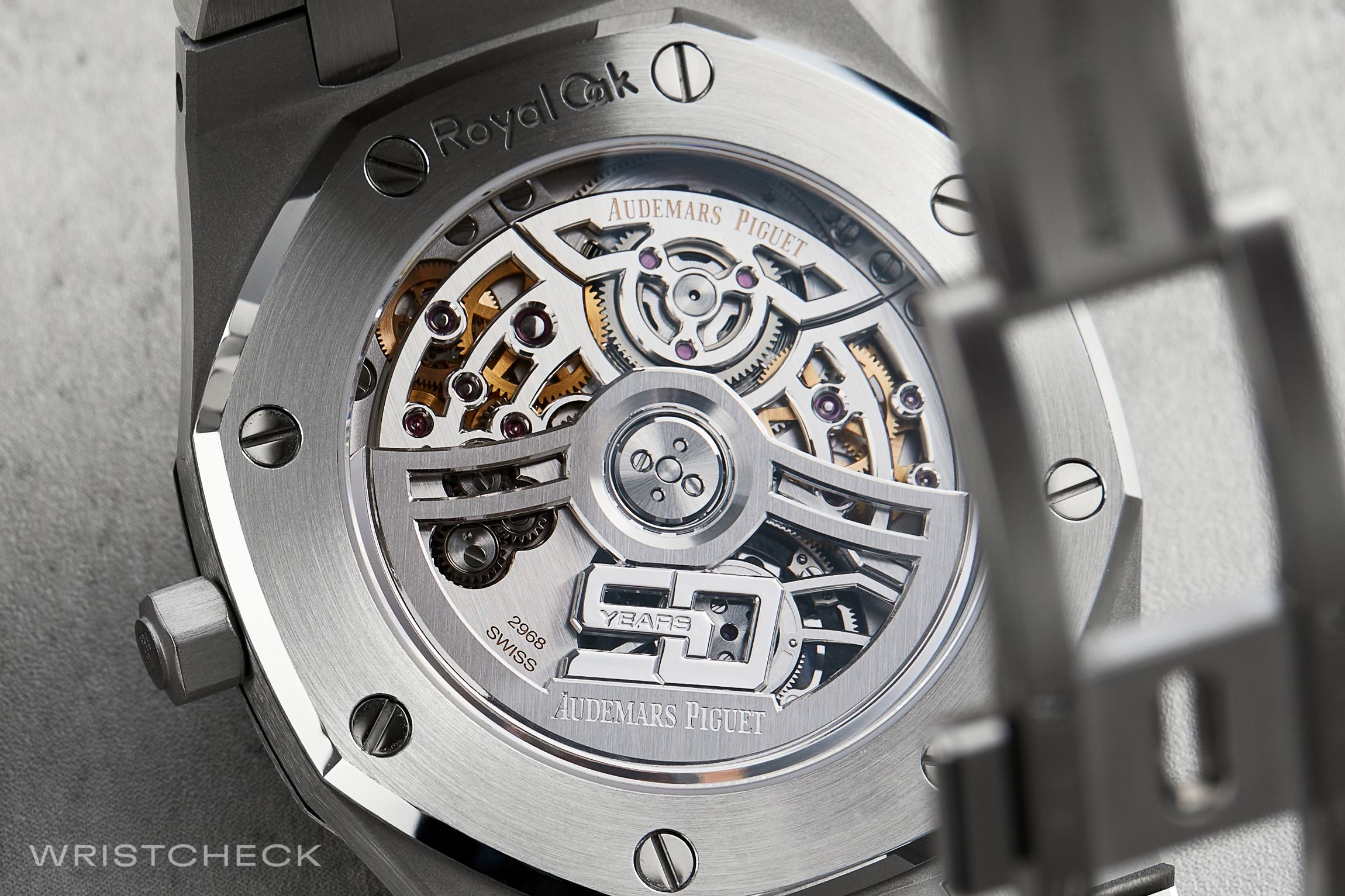 the caliber 2968 looks quite a lot like a re-engineered 7121, including the arrangement of the automatic winding train and the position and configuration of the mainspring barrel.
