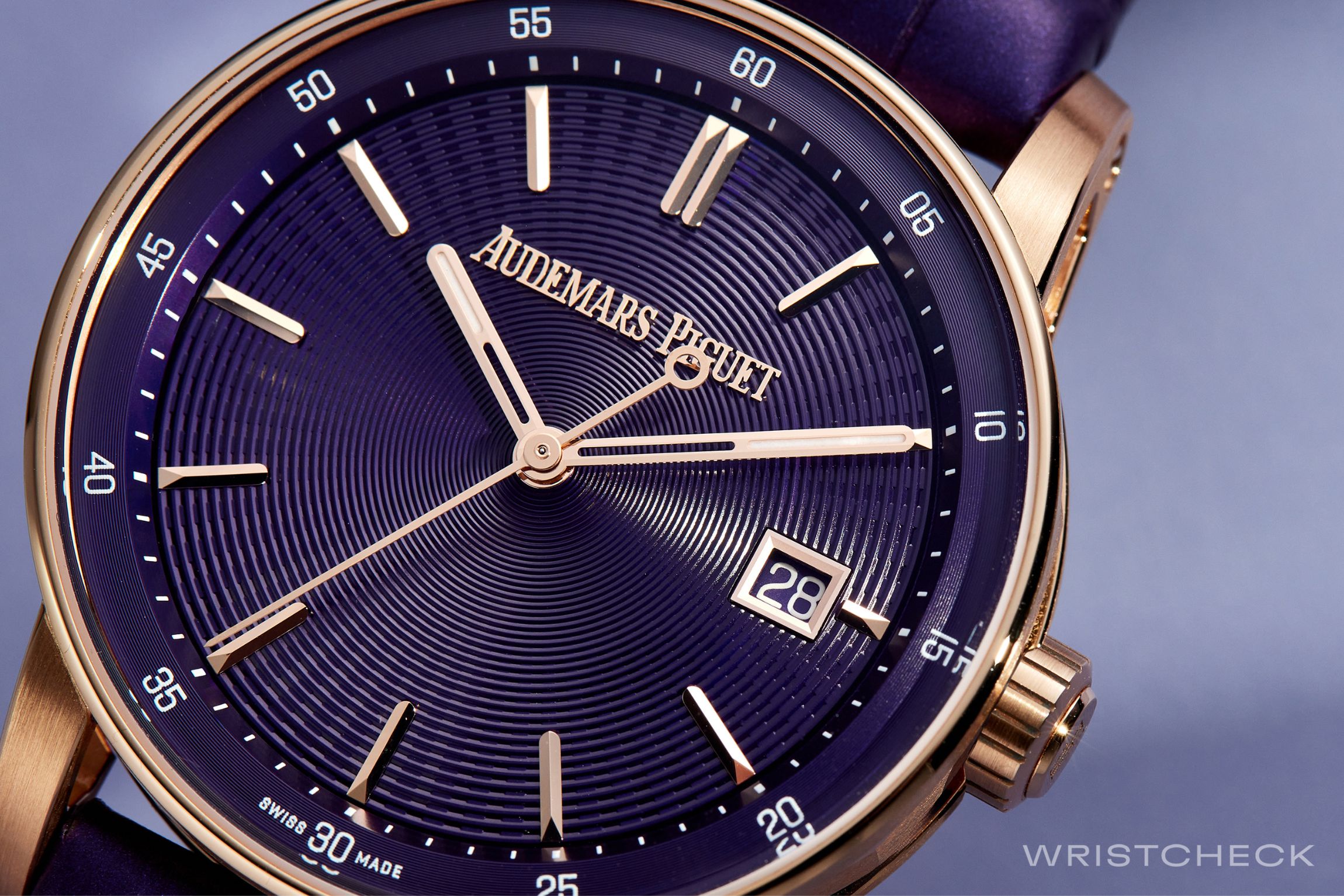 Features also include matching pink gold indices, openworked hour and minute hands, and a date window at 3 o’clock