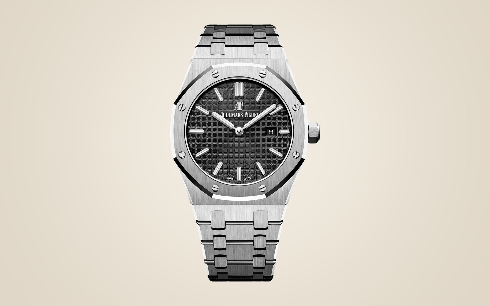 Audemars Piguet Royal Oak Quartz 67650ST on champagne background