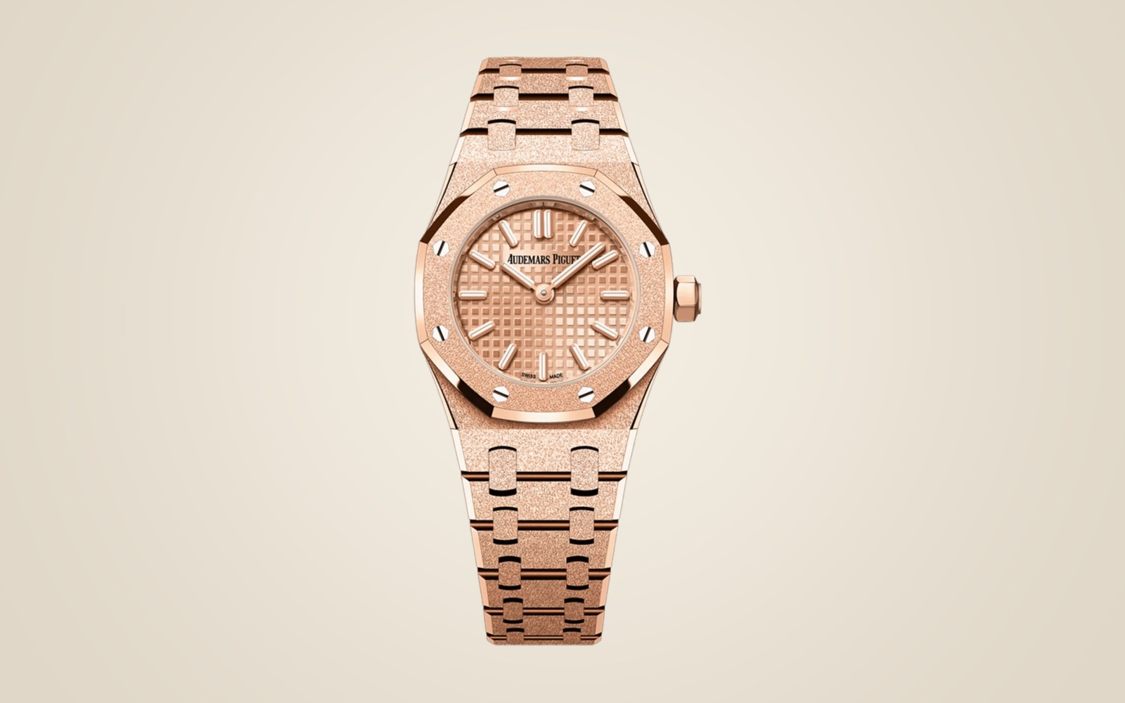 Audemars Piguet Royal Oak Mini Frosted Gold 67630OR on champagne background