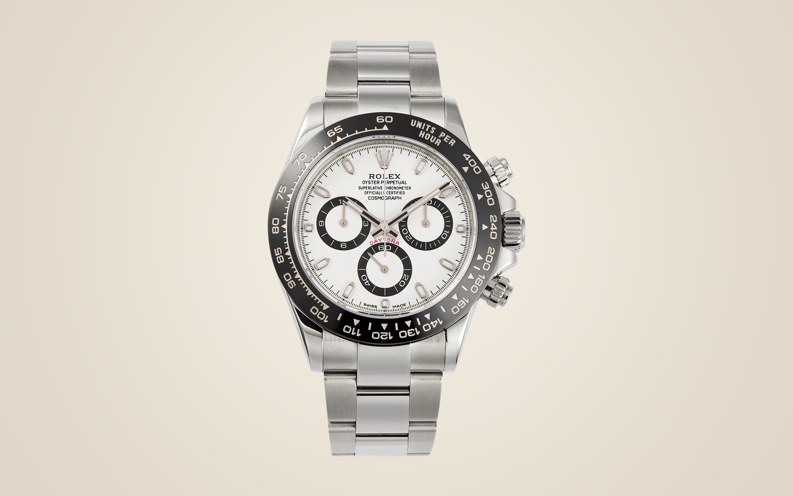 Rolex Daytona 116500LN on champagne background