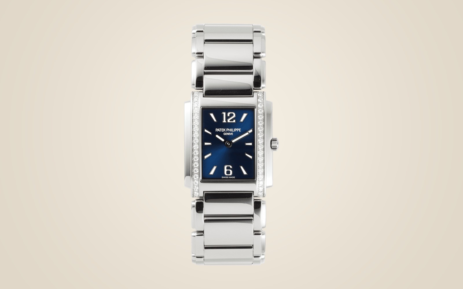Patek Philippe Twenty~4 Manchette on champagne background