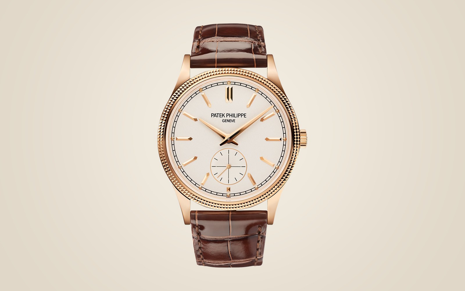 Patek Philippe Calatrava 6119R on champagne background
