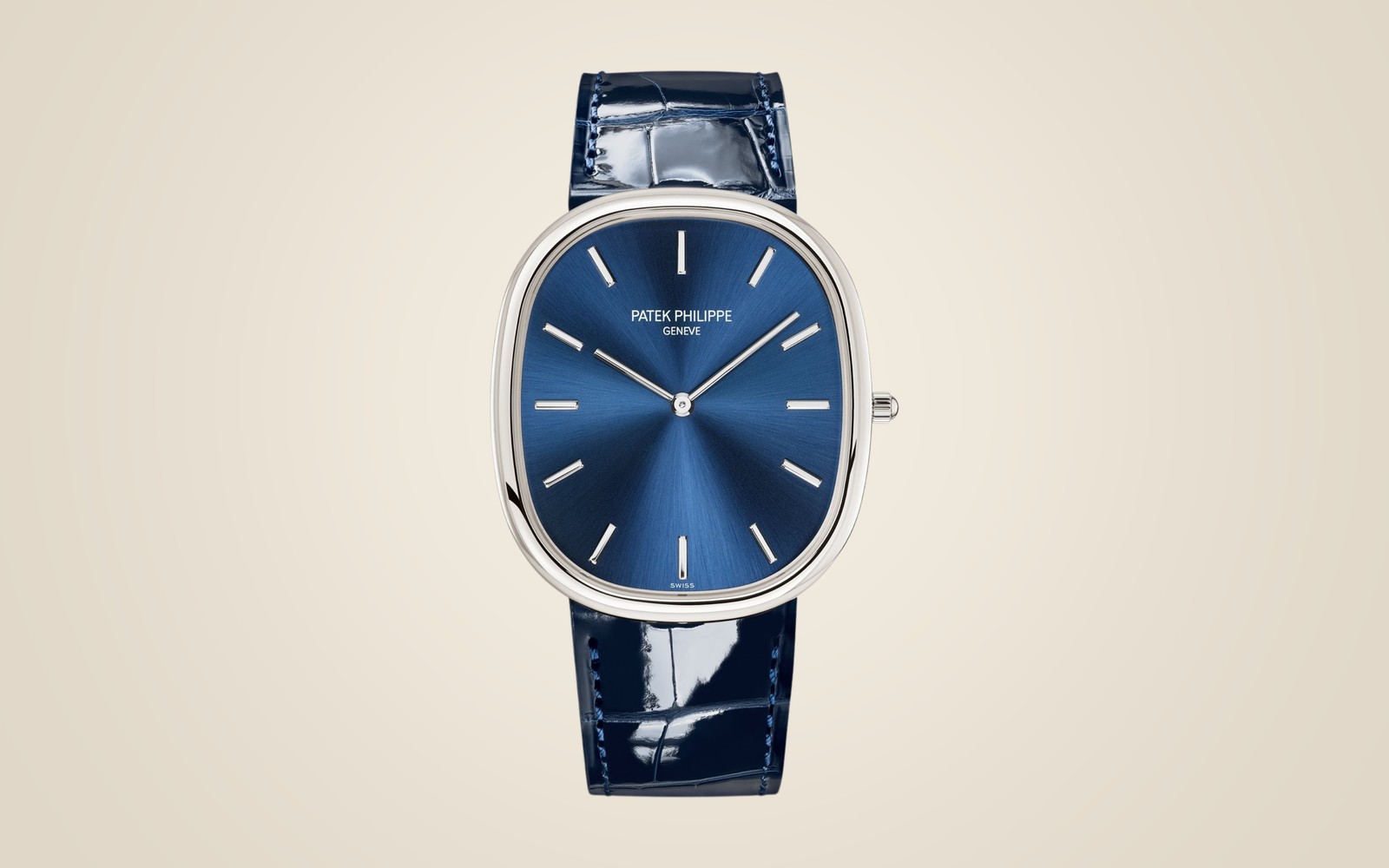 Patek Philippe Golden Ellipse 5738P on champagne background