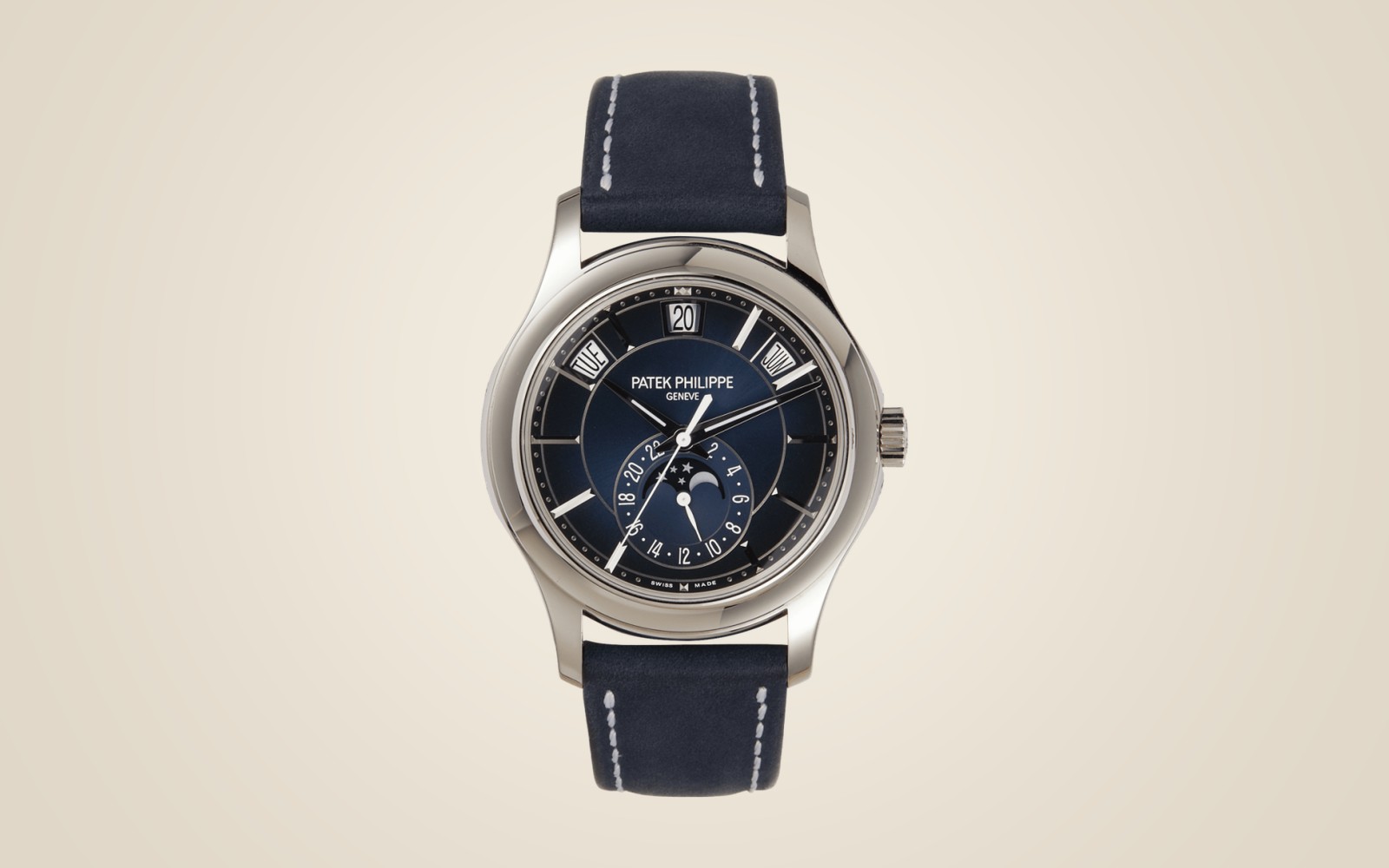 Patek Philippe Annual Calendar 5205G on champagne background