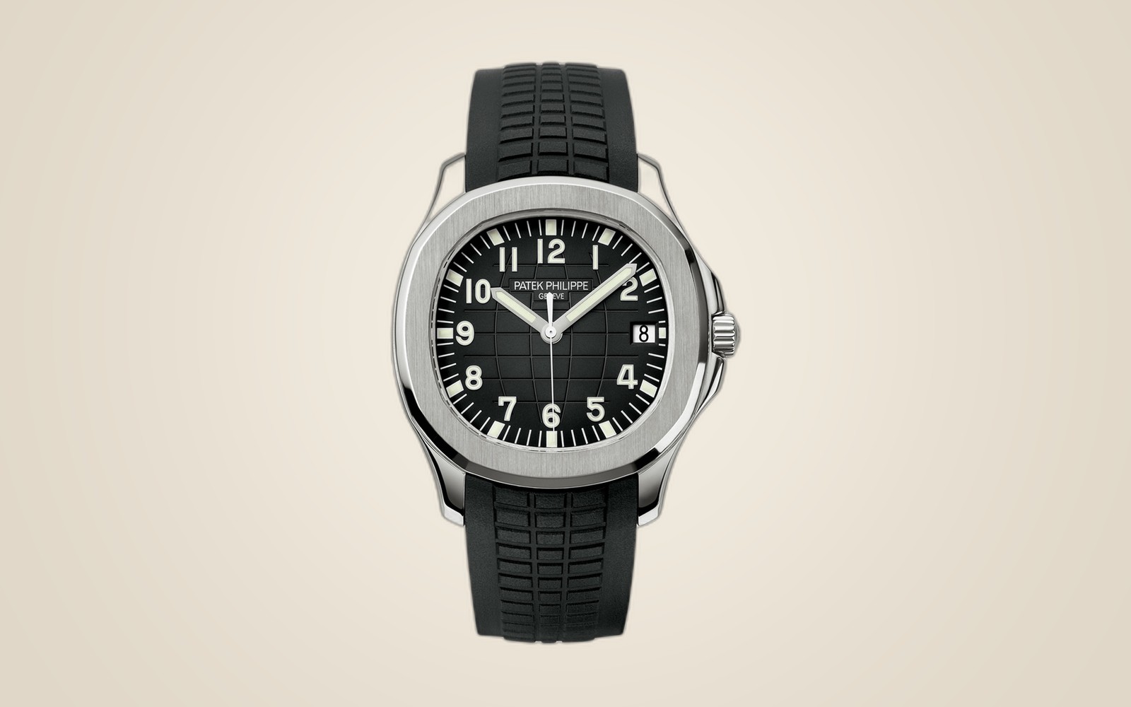 Patek Philippe Aquanaut 5167A on champagne background