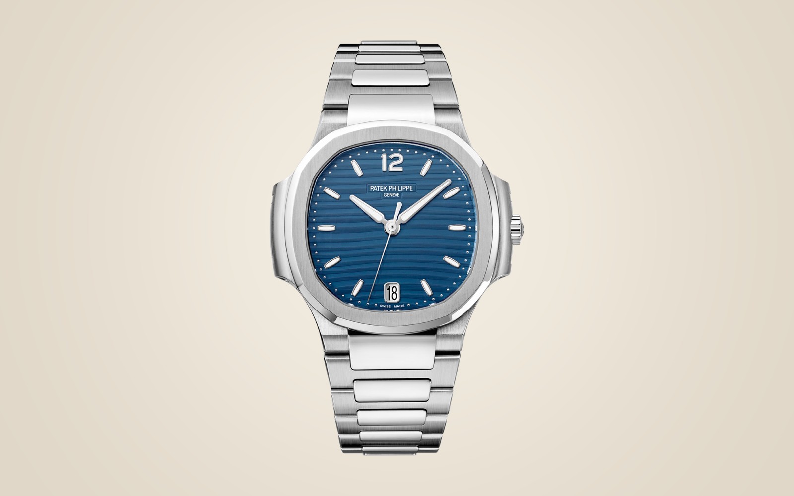 Patek Philippe Nautilus 7118 on champagne background