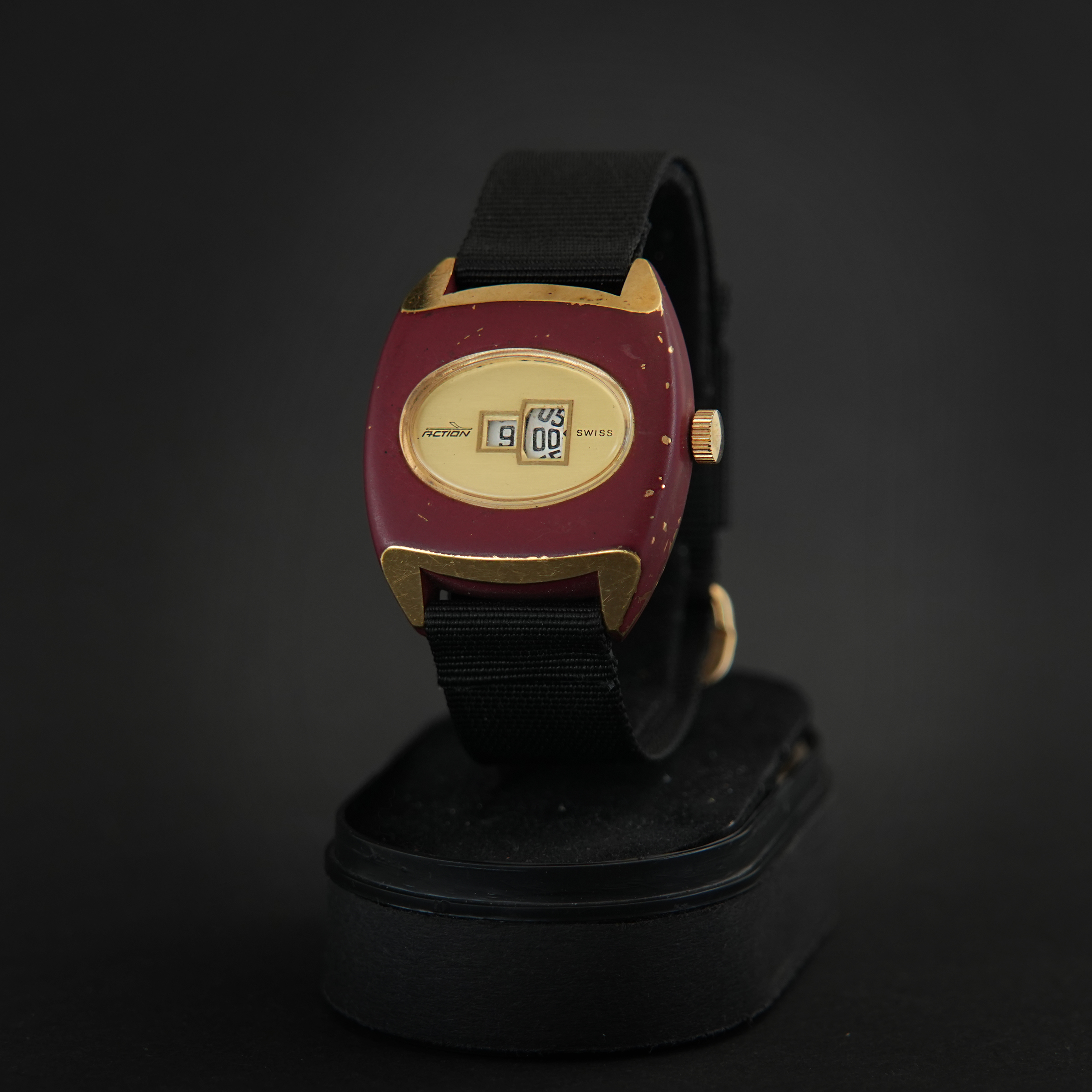 Action | Gold-Tone and Red Case