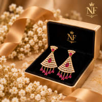 Fan shaped gold tone earrings with Ruby Red stones and sparkling CZ detailing