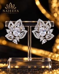 Elegant white CZ stud earrings with oval center stone and crystal accents