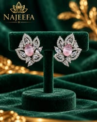 Pink floral stud earrings with oval center stone and crystal halo