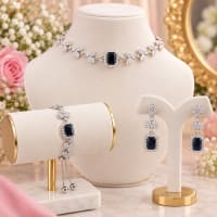 Black bridal crystal jewelry set with floral leaf design and matching earrings