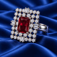 Ruby red rectangular stone adjustable statement ring with silver-tone CZ geometric halo