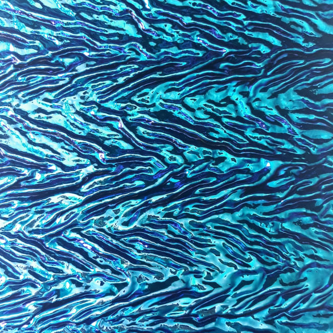 COE90 DIKROISK PÅ SORT U51-56 UBGR-OR GRANITE RIPP