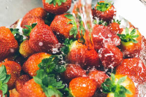 Strawberries being rinsed with fresh water