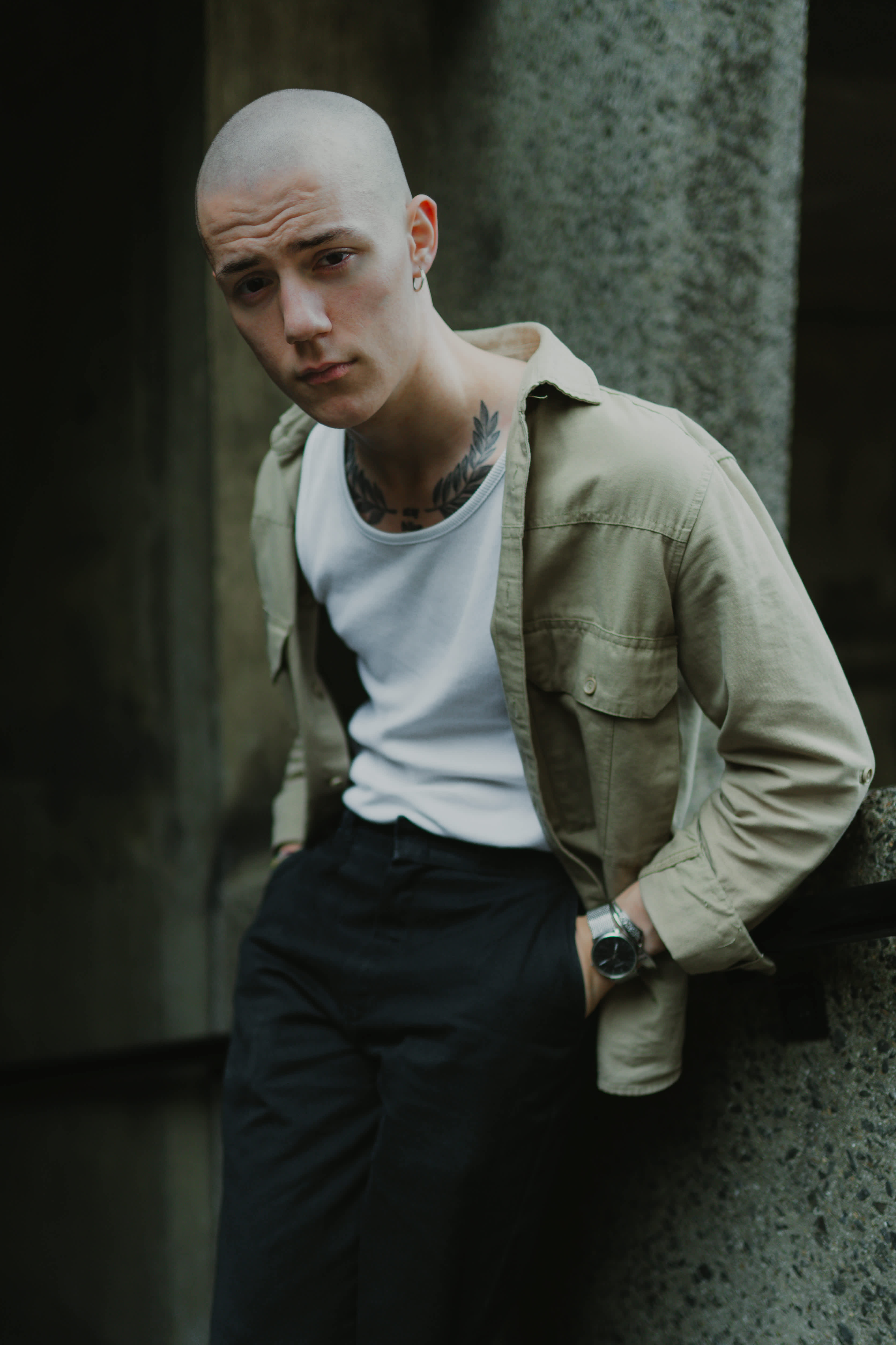 Portrait of a guy on a white and beige shirt